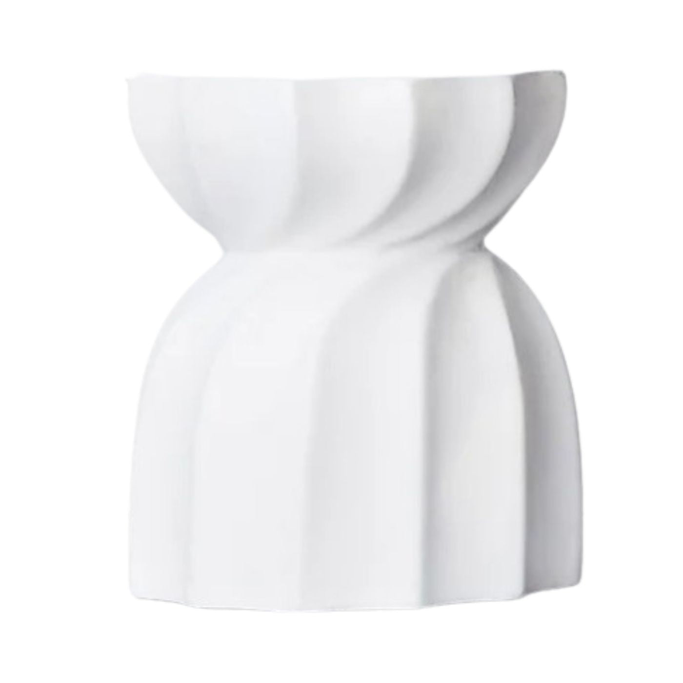 White decorative object with a geometric design on a white background