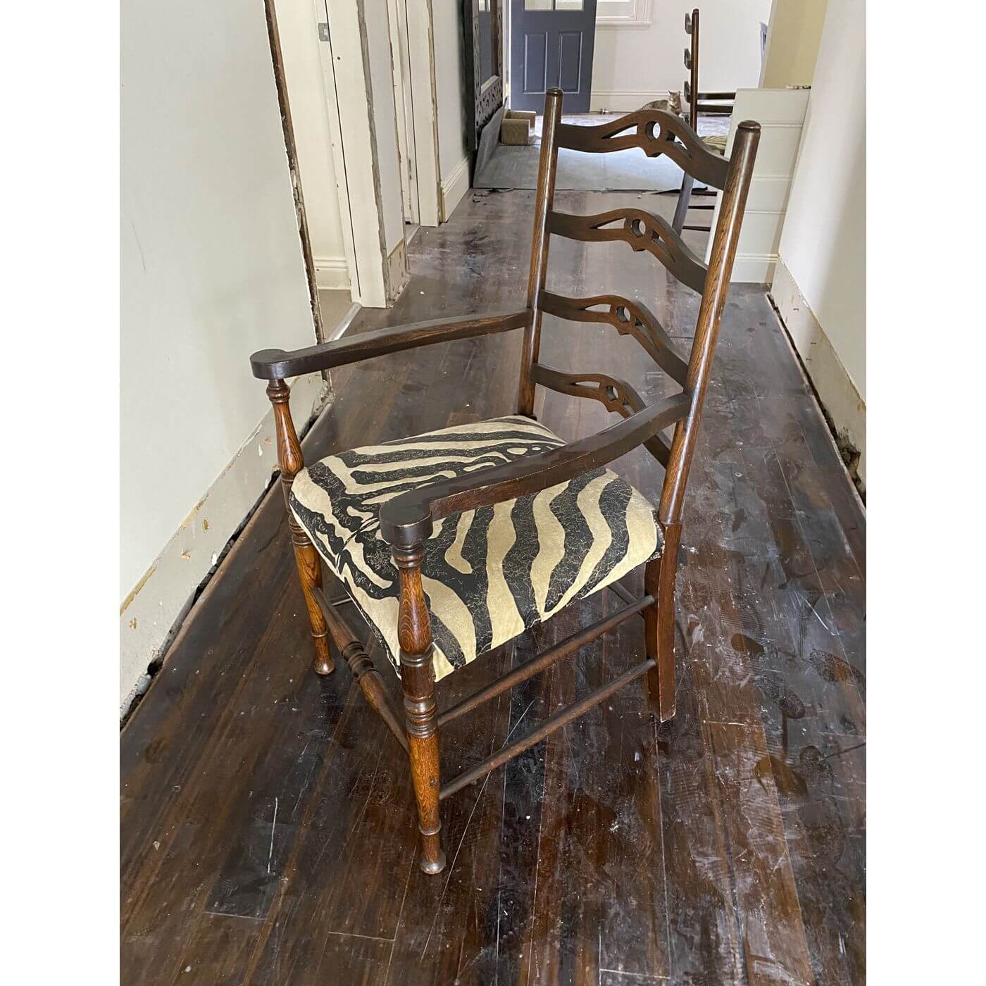 Antique chairs with zebra seat