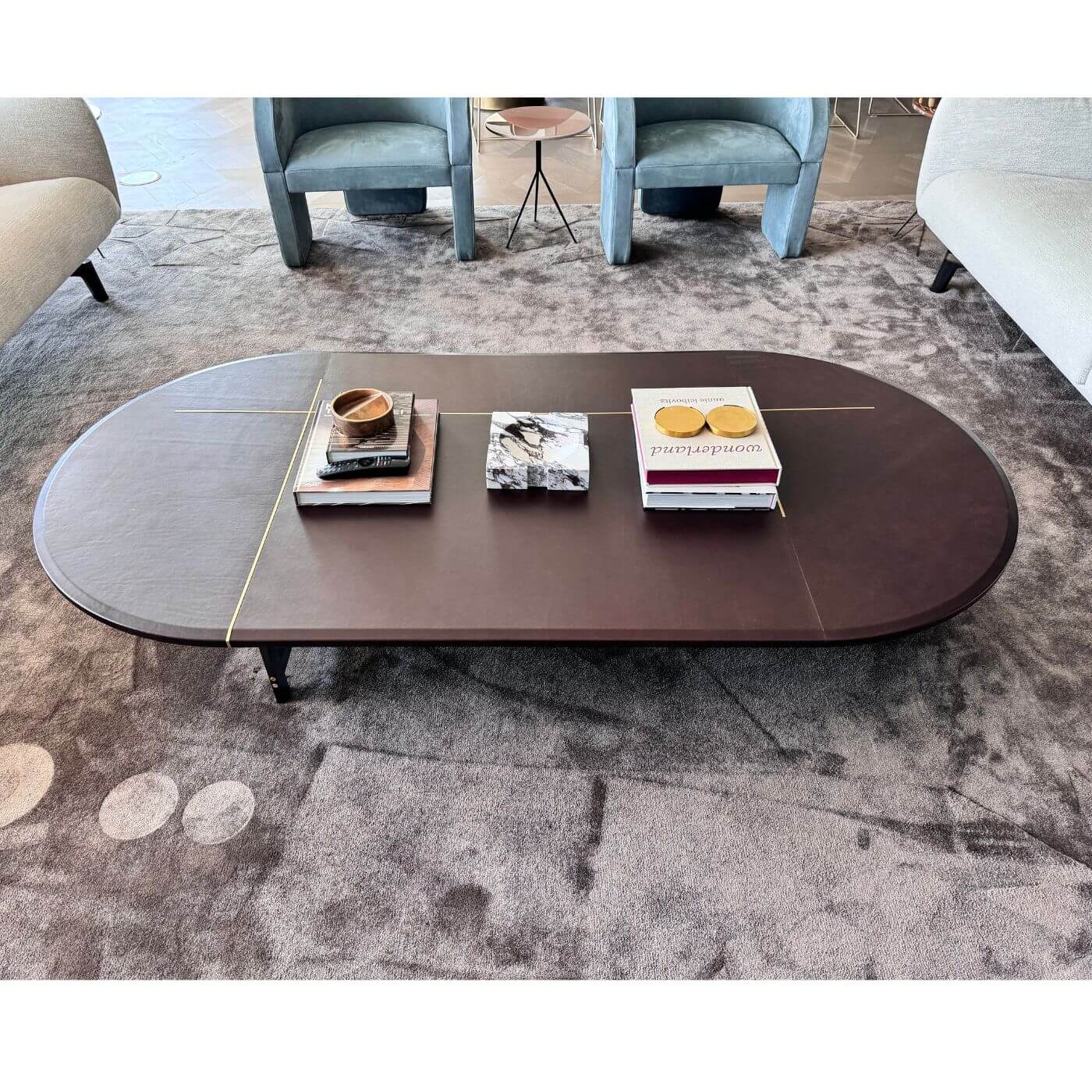 Two-Design-Lovers-Baxter-Leather-and-brass-oval-coffee-table