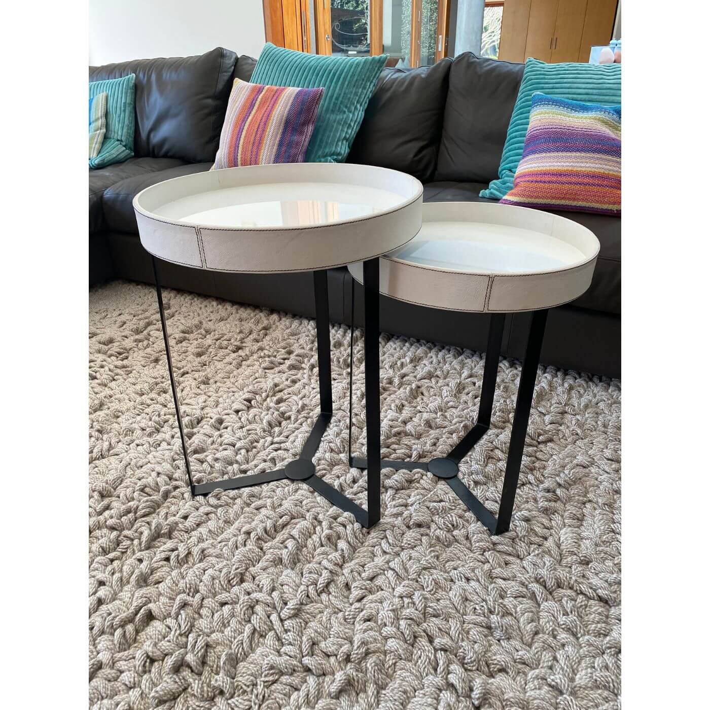 Two-Design-Lovers-Cream-and-metal-circular-side-tables