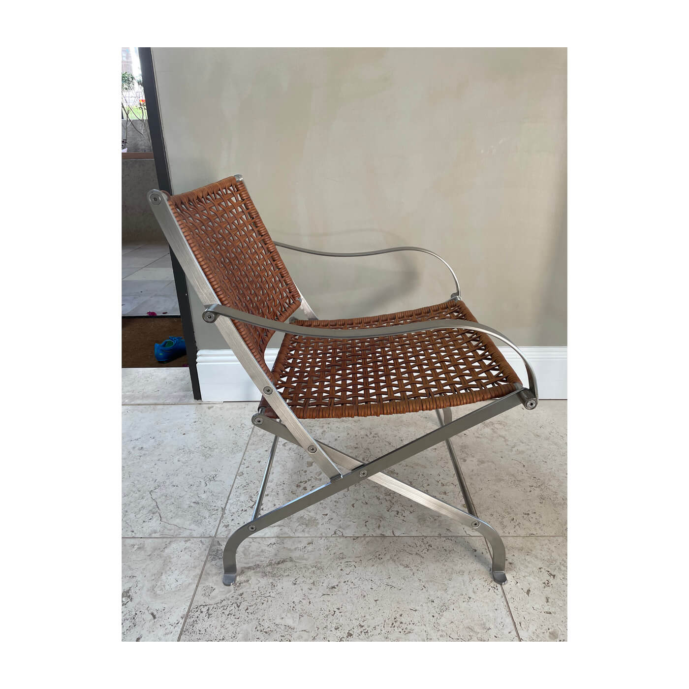 Flexform Carlotta folding chair in tan leather