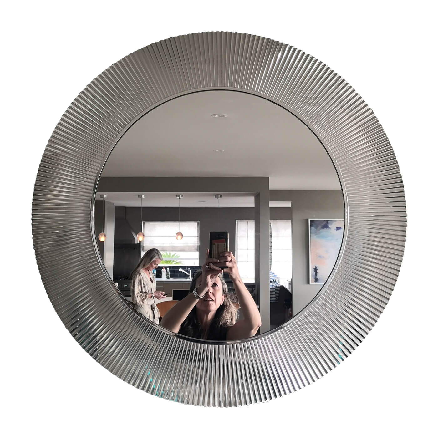 round mirror with fluted mirror edge, purchased at Space Furniture