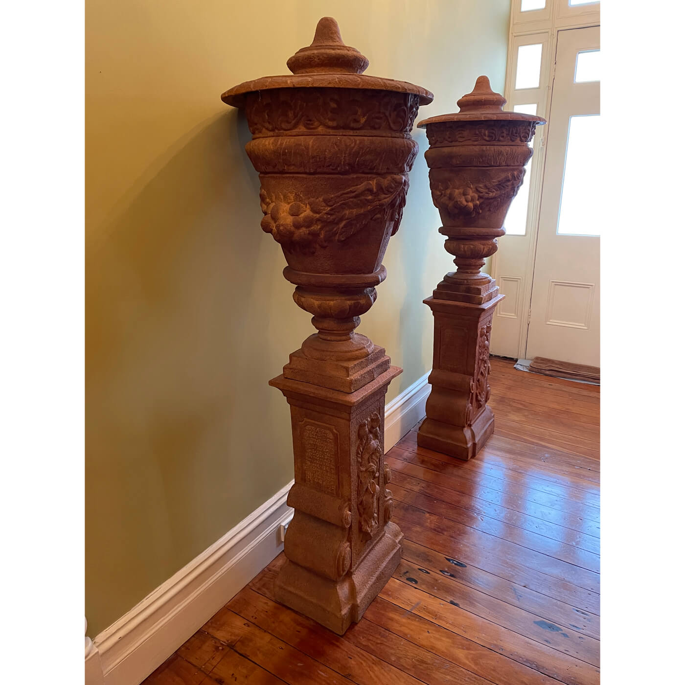 Large garden Urns with Plinths, pair