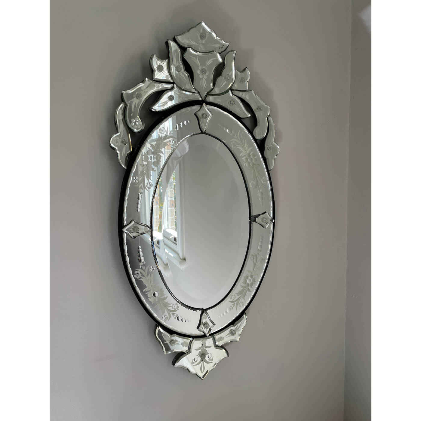 Venetian mirror, oval with floral pattern