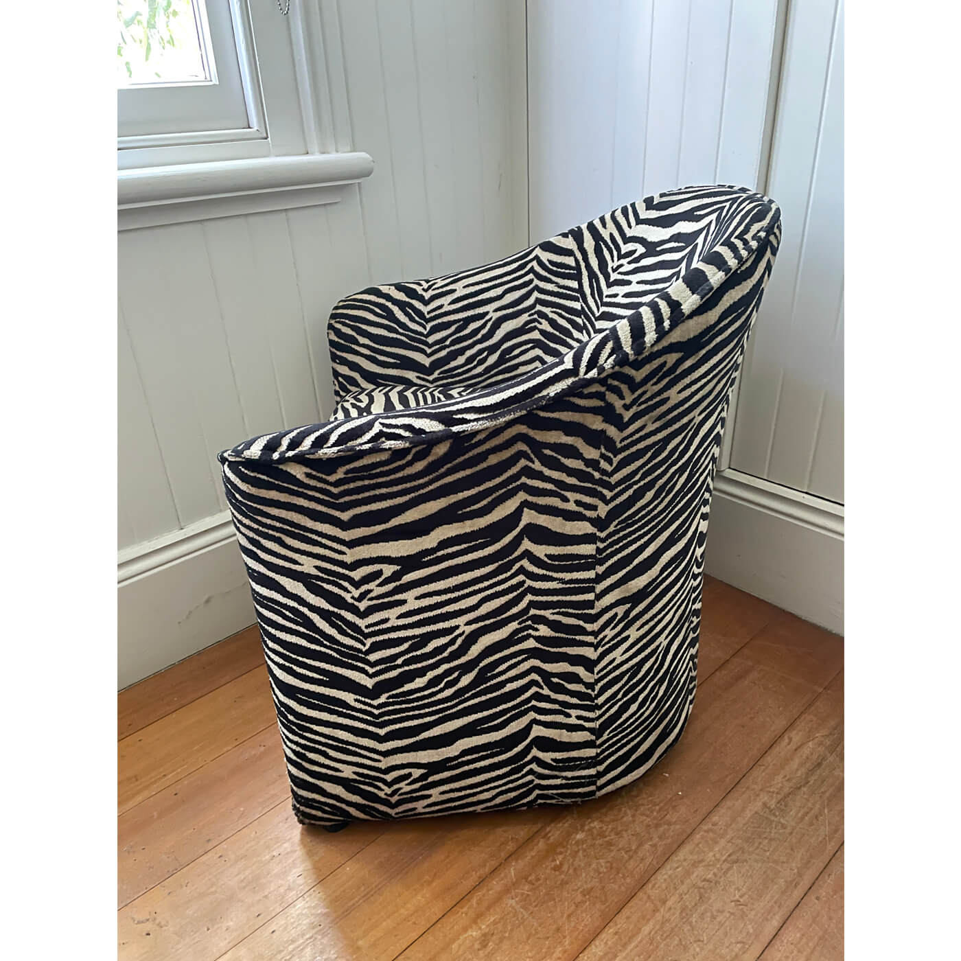 Zebra print tub chairs and ottoman