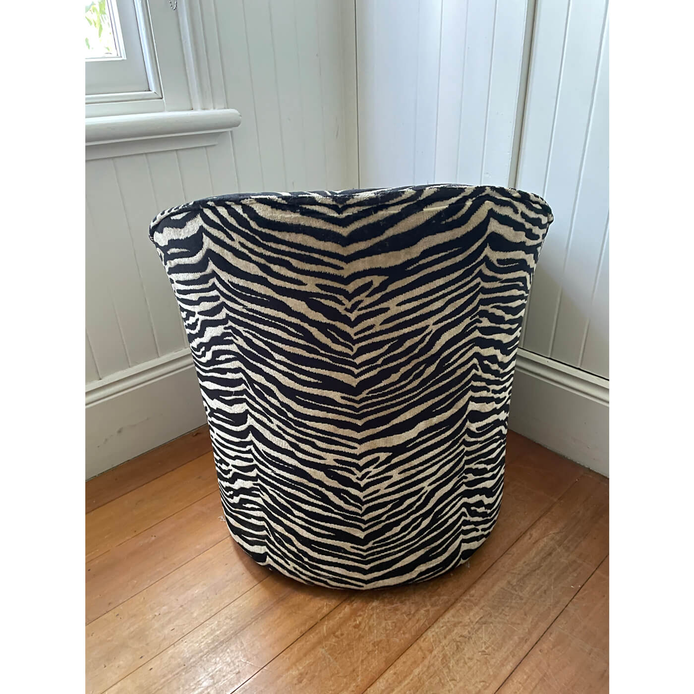 Zebra print tub chairs and ottoman