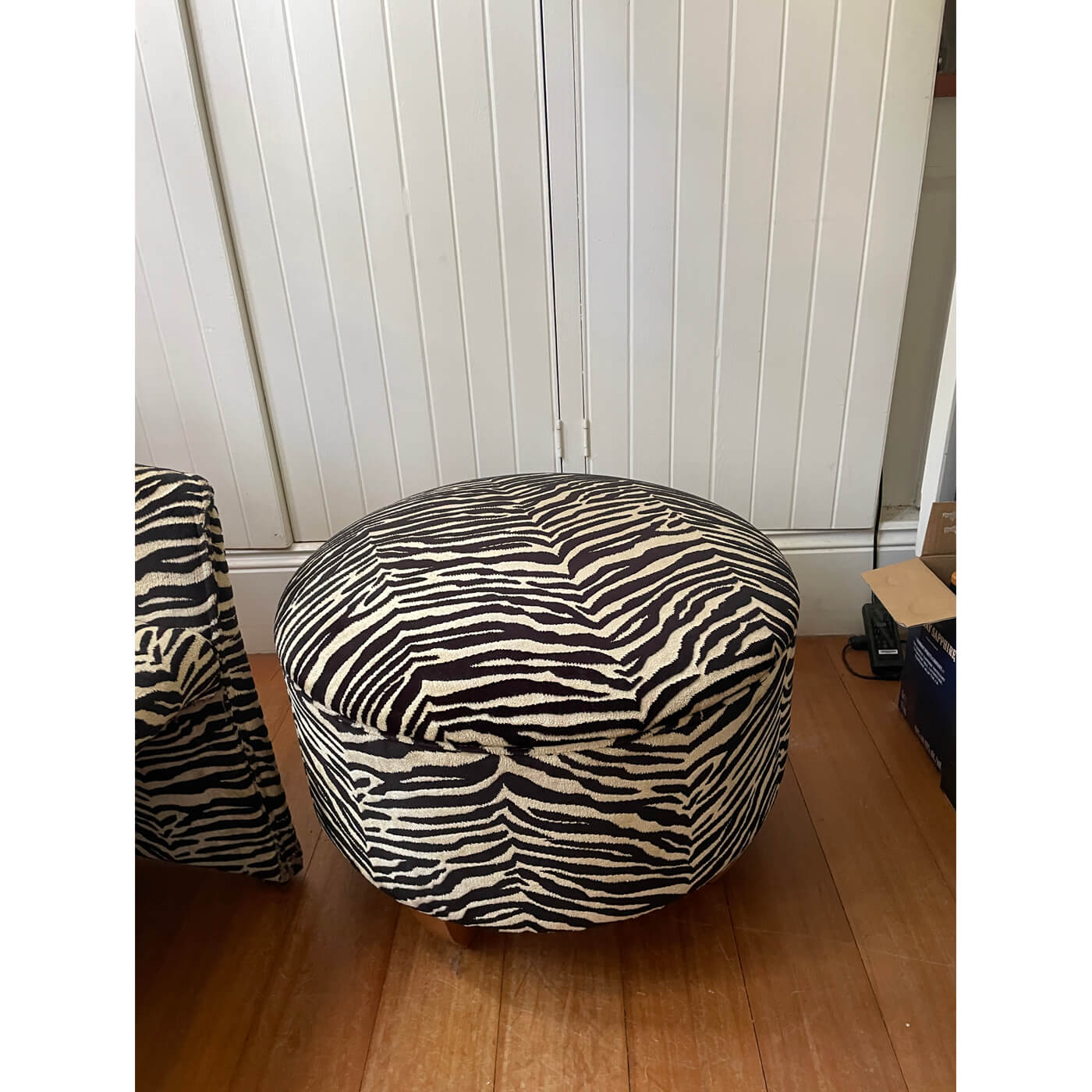 Zebra print tub chairs and ottoman