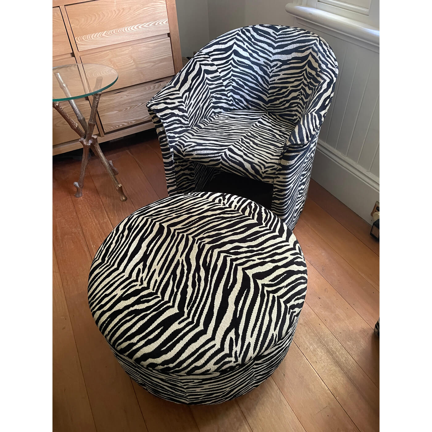 Zebra print tub chairs and ottoman