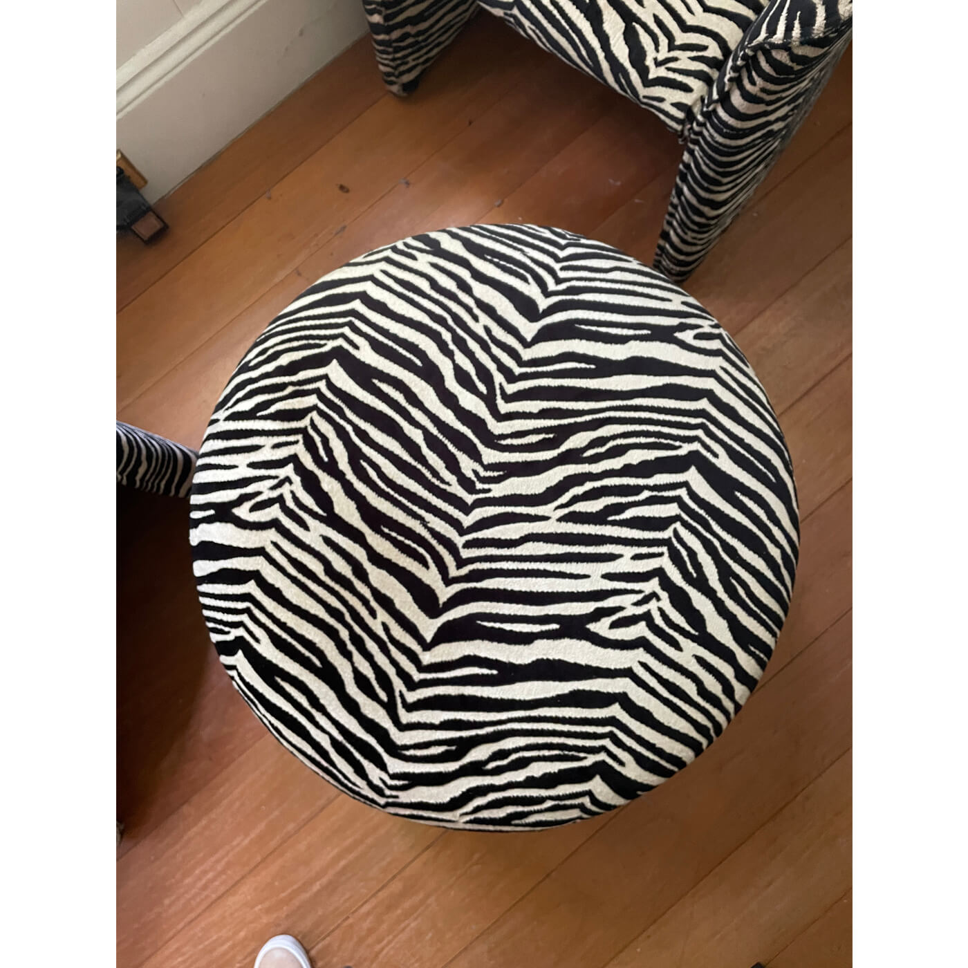 Zebra print tub chairs and ottoman