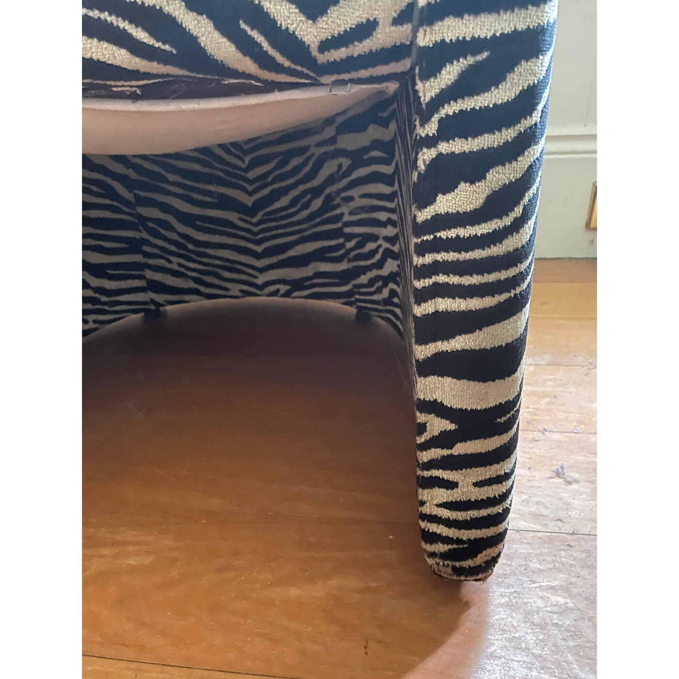 Zebra print tub chairs and ottoman