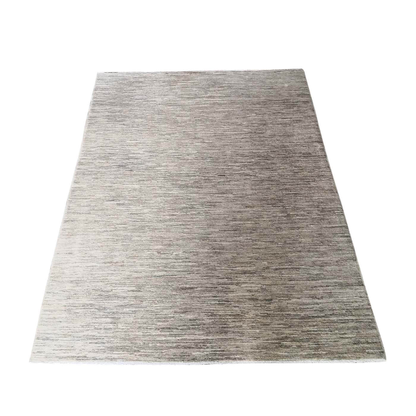 Wool rug in mixed beige tones