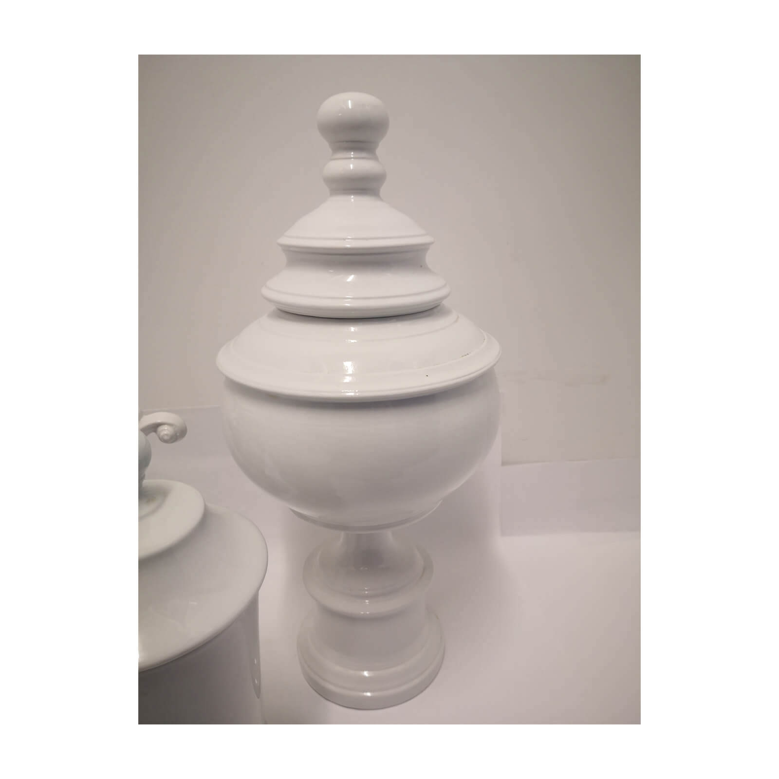 Collection of Lidded White Ceramic Vessels