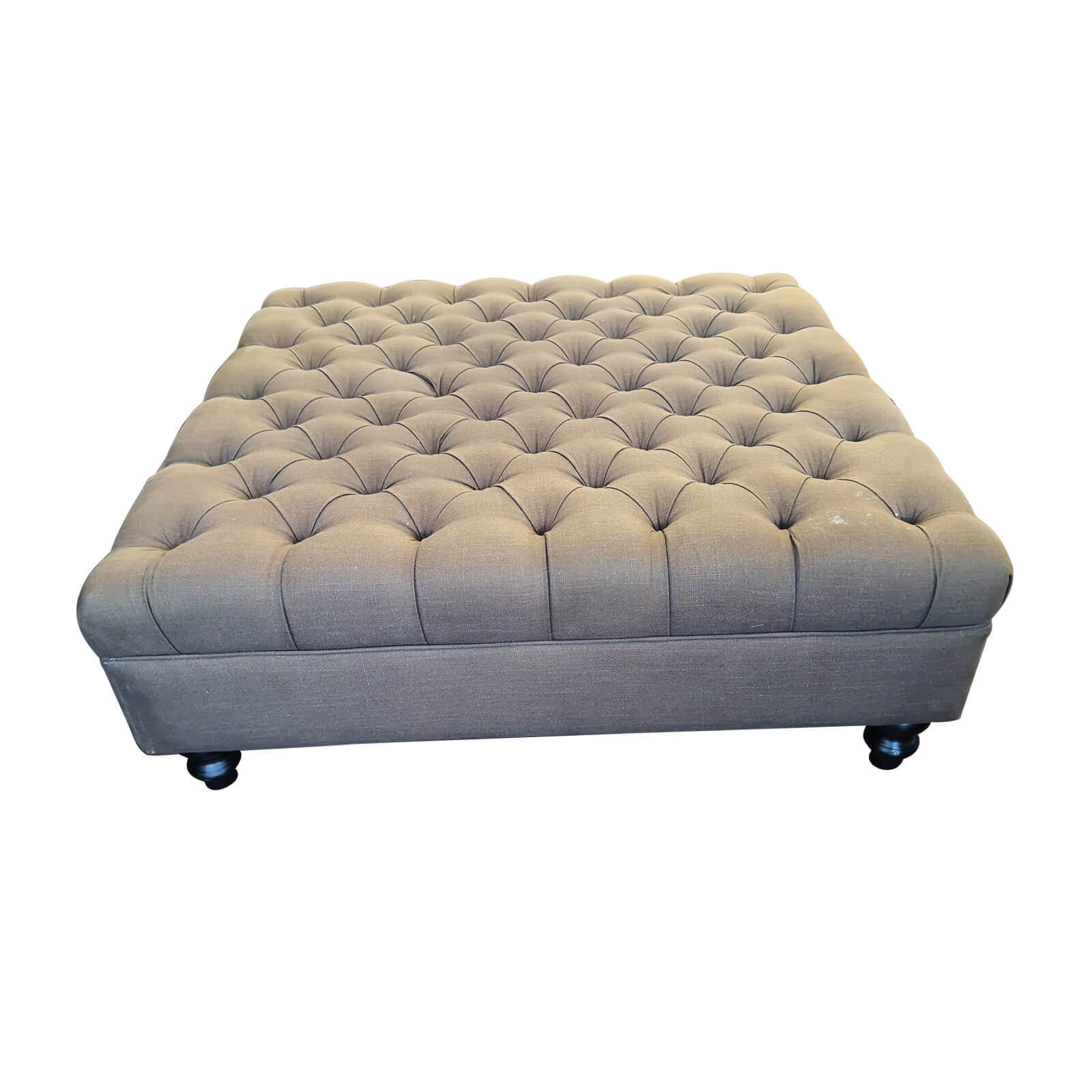 Large ottoman with button upholstery