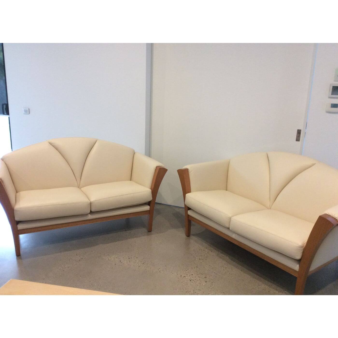 Handcrafted in Tasmania, leather 2 seater couches in art deco style