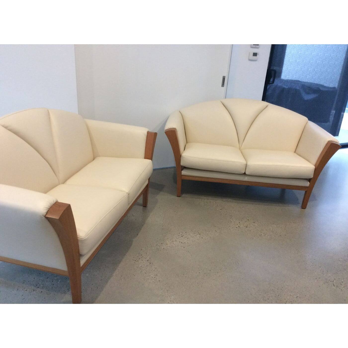 Handcrafted in Tasmania, leather 2 seater couches in art deco style