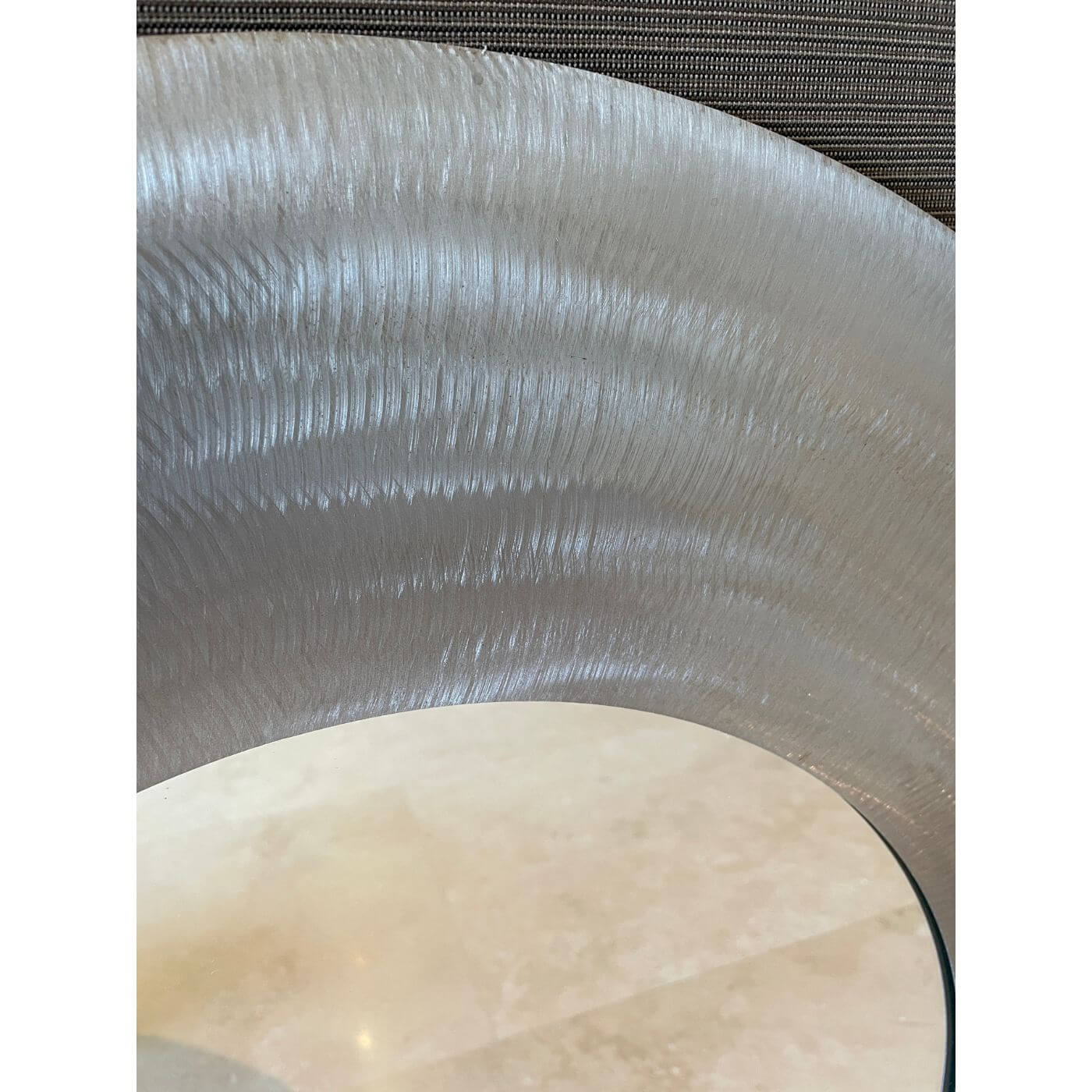 Round brushed metal mirror