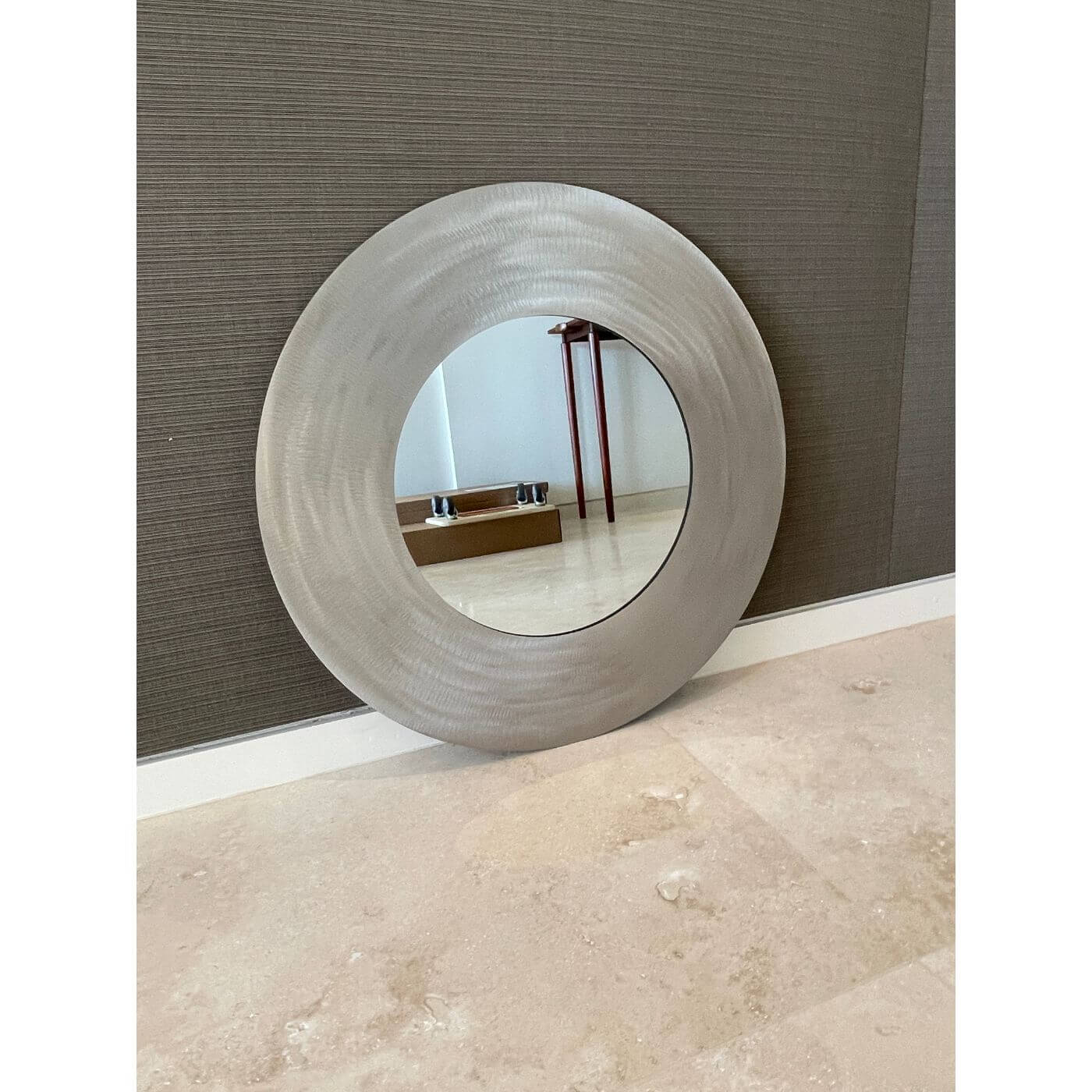 Round brushed metal mirror